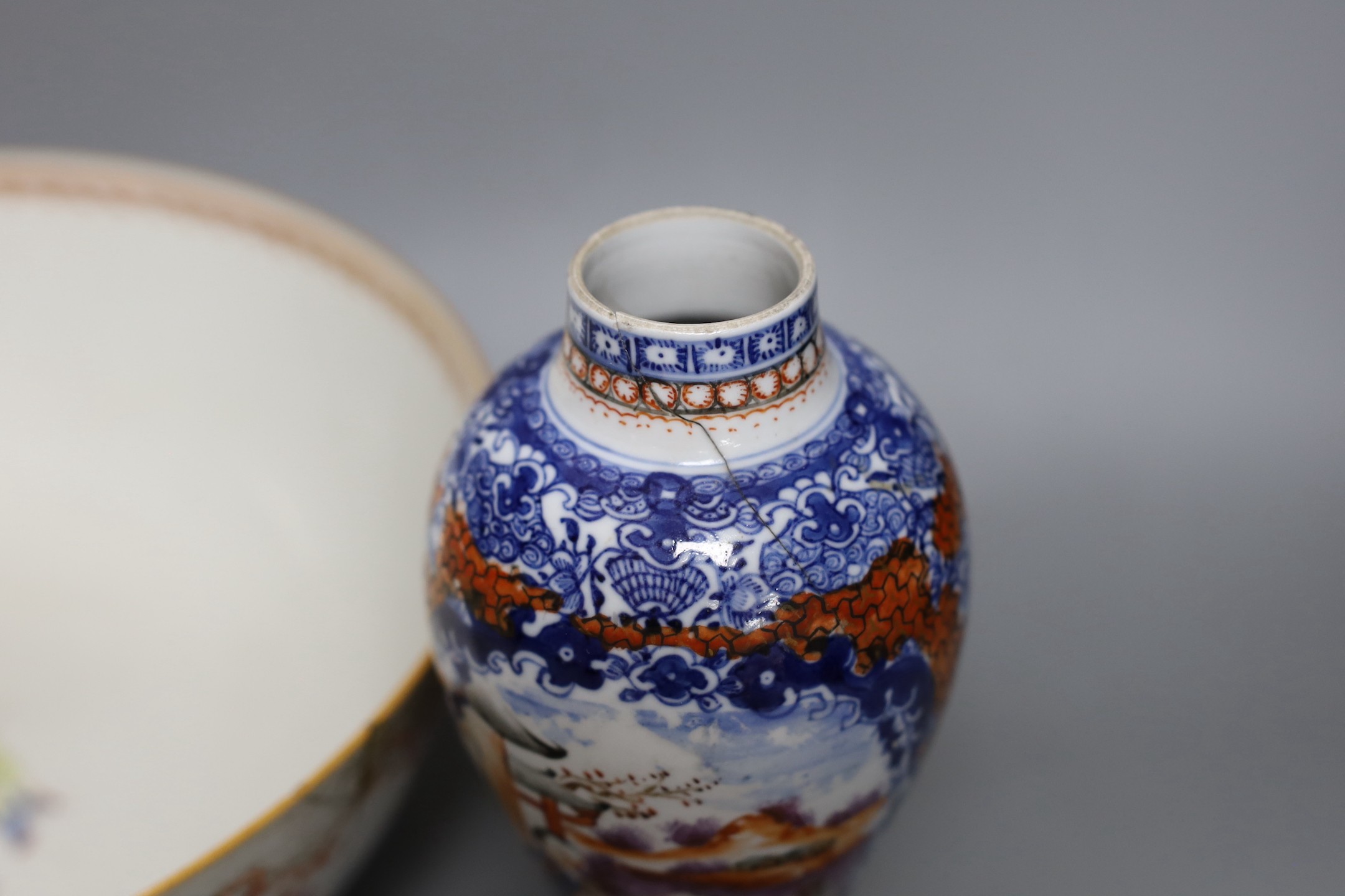 An 18th century Chinese export famille rose bowl and a similar mandarin pattern vase, bowl 26cm diameter